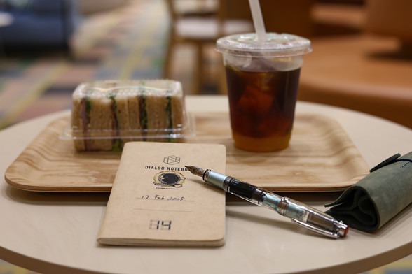 iced coffee with citrus syrup 
sandwiches
fountain pen (twain)
dialognotebook