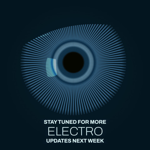 Dark background. Large and centred is a graphic rendition of a humanoid robot eye. Centred, below the eye, in white capital letters, is the caption: Stay tuned for more ELECTRO updates next week