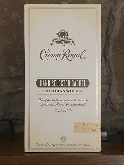 A box containing a bottle of premium Crown Royal Canadian whisky.